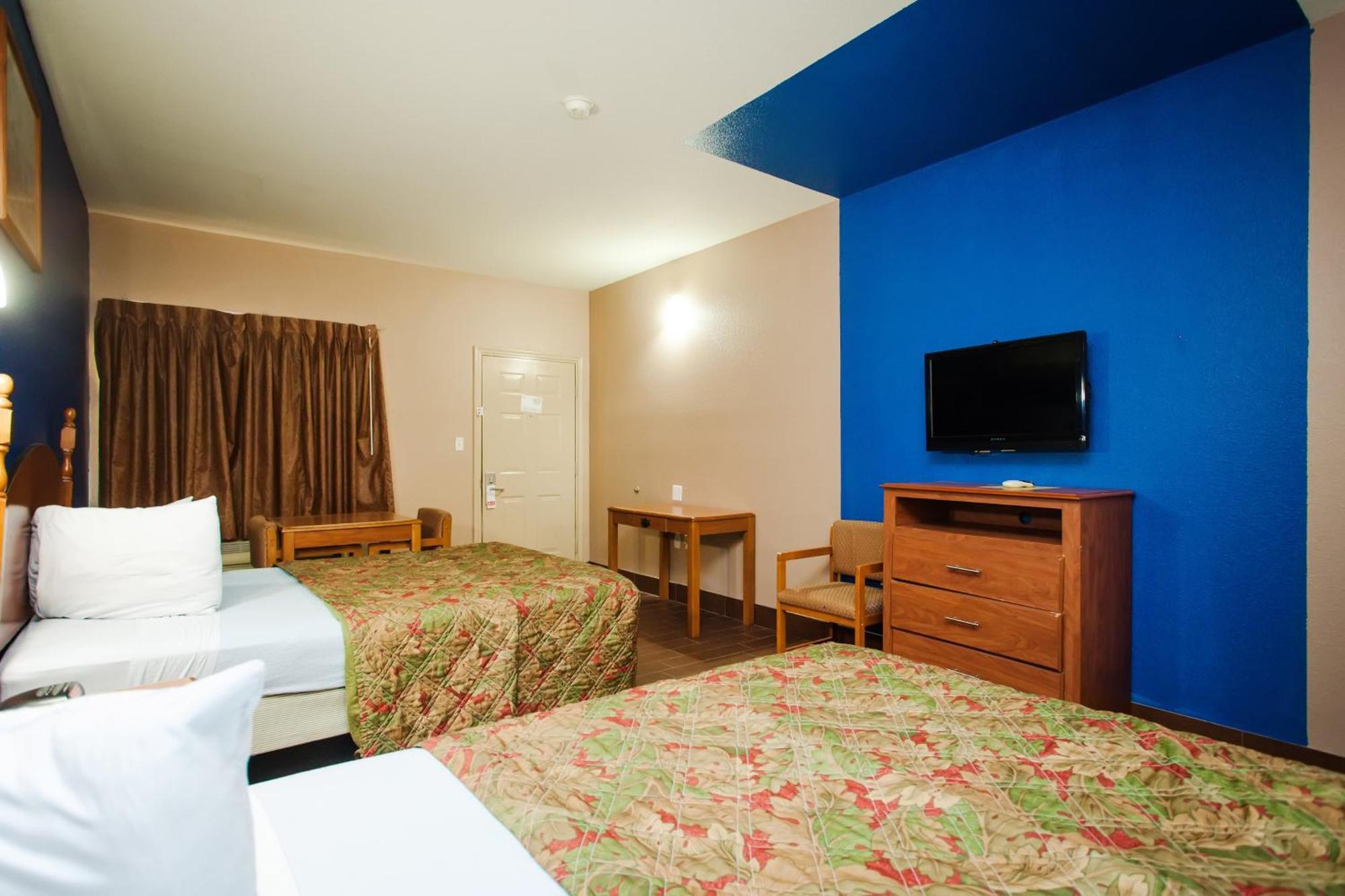 Scottish Inn & Suites Hankamer Oda fotoğraf