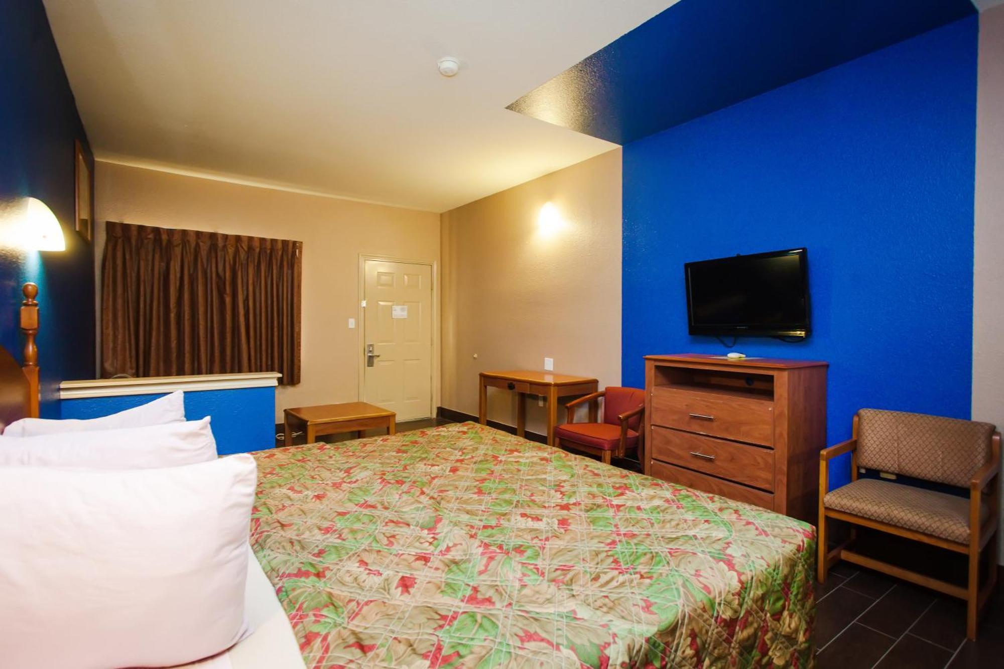 Scottish Inn & Suites Hankamer Oda fotoğraf
