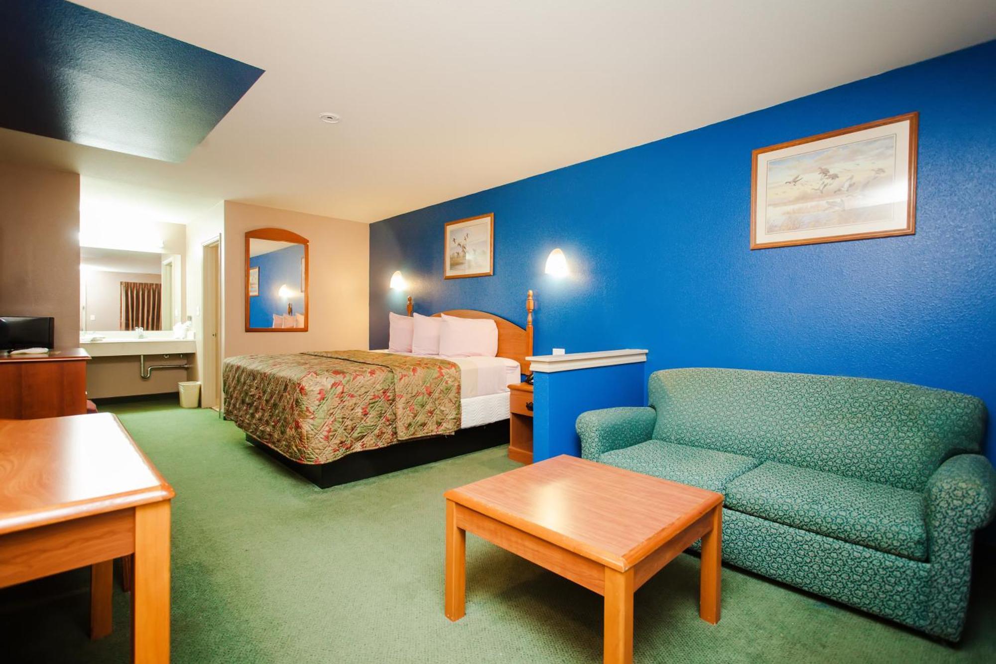 Scottish Inn & Suites Hankamer Oda fotoğraf