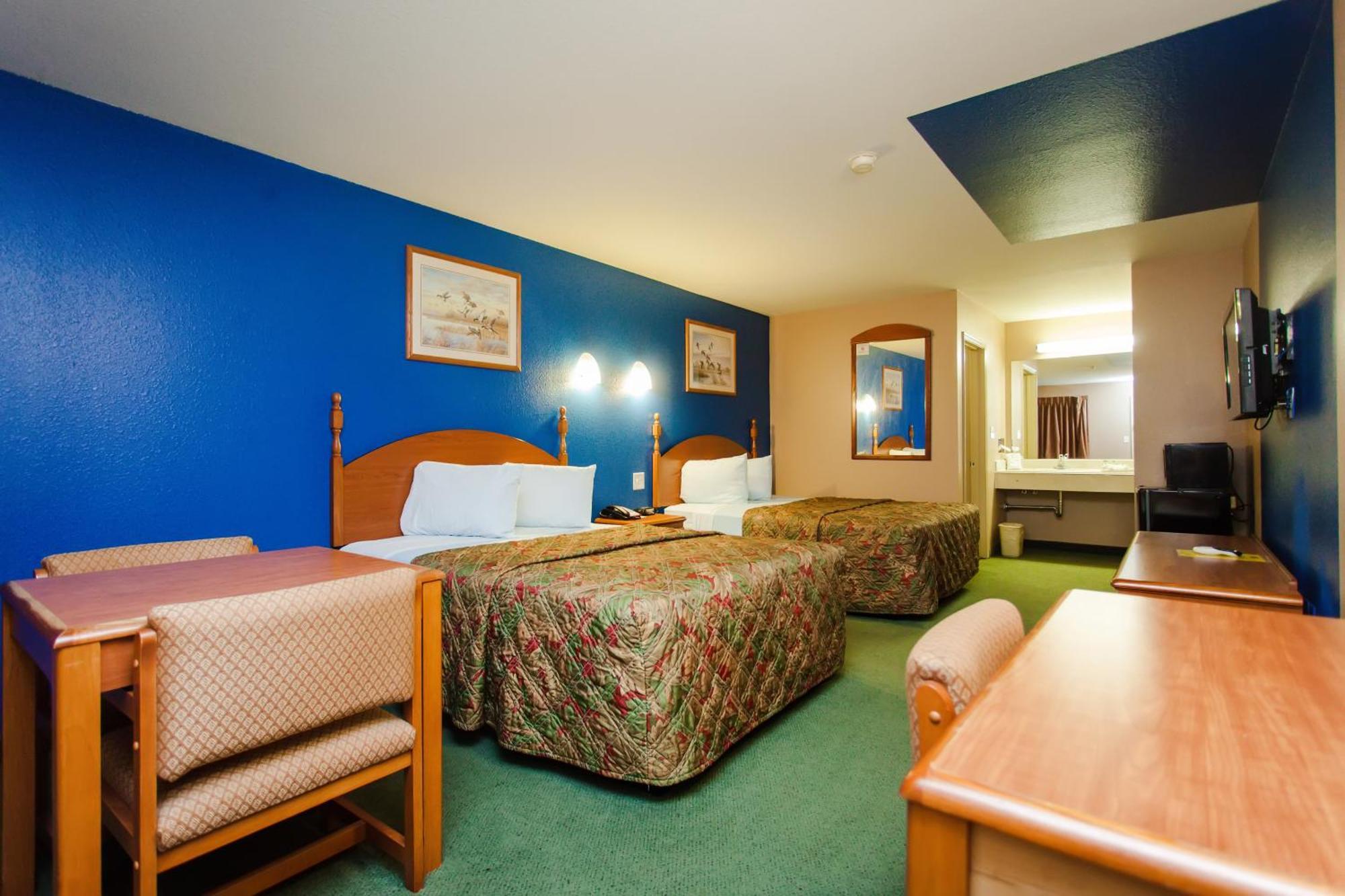 Scottish Inn & Suites Hankamer Oda fotoğraf
